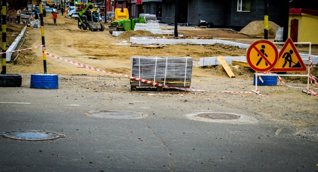road-construction-with-warning-signs-and-materials-hylm6mehamm